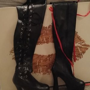 Black faux leather thigh high boots